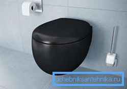 Zaobljeni oblici crnog WC-a u modernom stilu Zaobljeni oblici crnog WC-a u modernom stilu